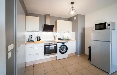 Cuisine ou kitchenette dans l'établissement L'echappée belle