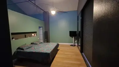 Un ou plusieurs lits dans un hébergement de l'établissement Loft 500M2