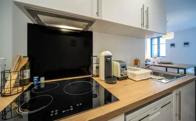 Cuisine ou kitchenette dans l'établissement Le Saint-Georges 4