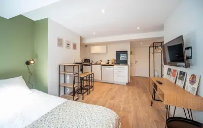 Cuisine ou kitchenette dans l'établissement Le Saint-Georges 5