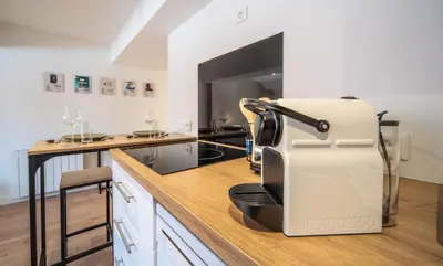 Cuisine ou kitchenette dans l'établissement Le Saint-Georges 6