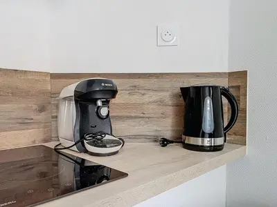 Cuisine ou kitchenette dans l'établissement Le Petit Jules