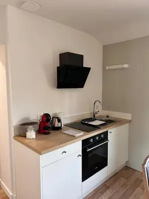Cuisine ou kitchenette dans l'établissement L'escapade