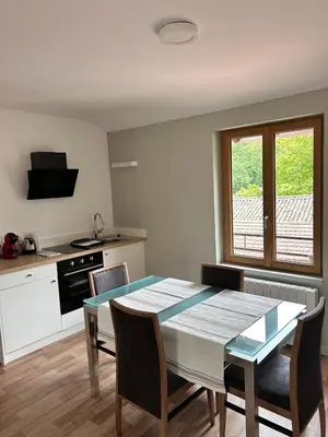 Cuisine ou kitchenette dans l'établissement L'escapade
