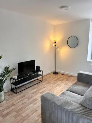Télévision ou salle de divertissement dans l'établissement L'escapade