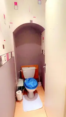 Un ou plusieurs lits dans un hébergement de l'établissement Api Appartement