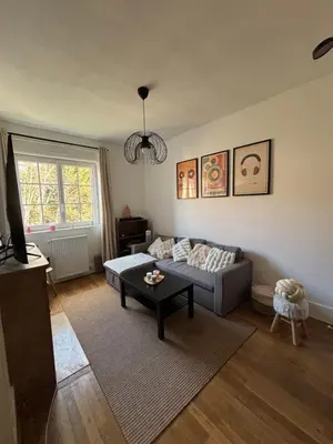 Coin salon dans l'établissement Appartement cosy 6 places