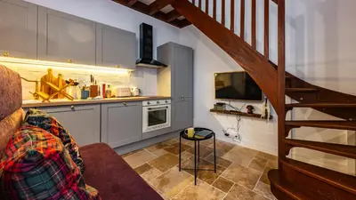 Cuisine ou kitchenette dans l'établissement La rêverie des ducs Suite au cœur de Dijon