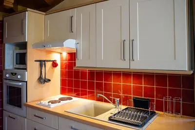 Cuisine ou kitchenette dans l'établissement PinotNoir
