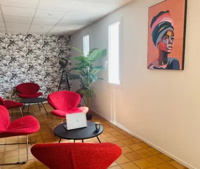 Coin salon dans l'établissement Kyriad Direct Chalon Sur Saone Nord