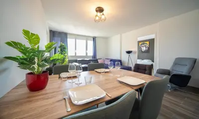 Coin salon dans l'établissement Appartement 3 chambres - Chalon
