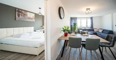 Un ou plusieurs lits dans un hébergement de l'établissement Appartement 3 chambres - Chalon