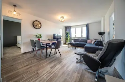 Coin salon dans l'établissement Appartement 3 chambres - Chalon