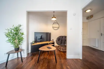 Télévision ou salle de divertissement dans l'établissement Cozy apartment - Close to center