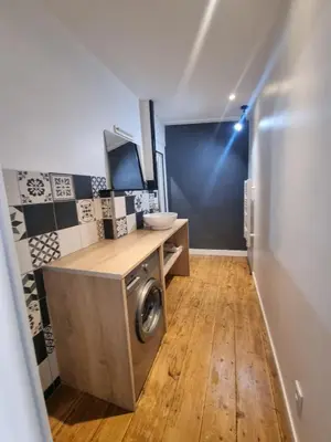 Cuisine ou kitchenette dans l'établissement Le Duplex
