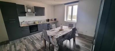Cuisine ou kitchenette dans l'établissement Le Duplex
