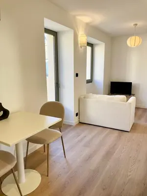 Coin salon dans l'établissement Appartement au pied des vignes avec terrasse