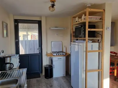 Cuisine ou kitchenette dans l'établissement Le Coquelicot, maison au calme dans le Morvan
