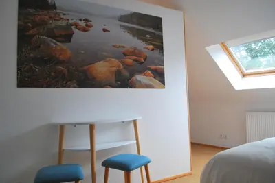 Un ou plusieurs lits dans un hébergement de l'établissement Maison Le Feu Follet
