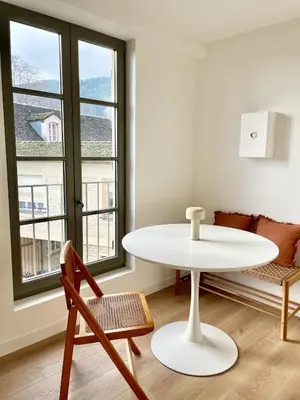 Coin salon dans l'établissement Appartement aux pieds des vignes - 5 min de Beaune