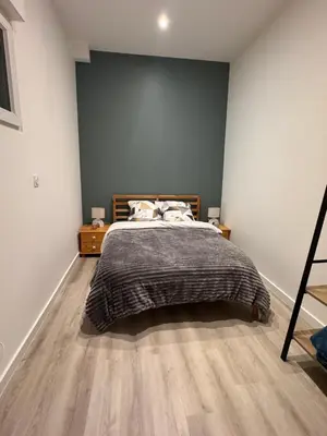 Un ou plusieurs lits dans un hébergement de l'établissement HOME 102 Cosy