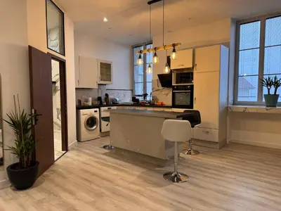 Cuisine ou kitchenette dans l'établissement HOME 102 Cosy