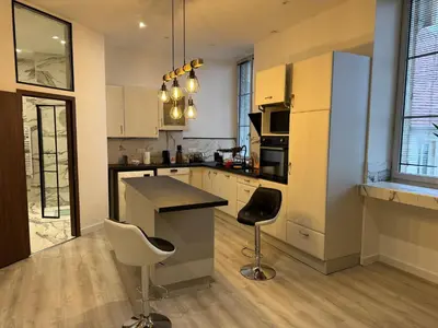 Cuisine ou kitchenette dans l'établissement HOME 102 Cosy