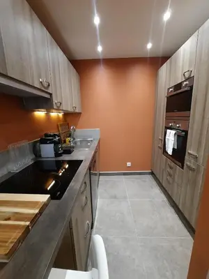 Cuisine ou kitchenette dans l'établissement L'Auguste, Appartement Lumineux & Central