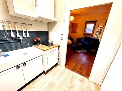 Cuisine ou kitchenette dans l'établissement Le Zola