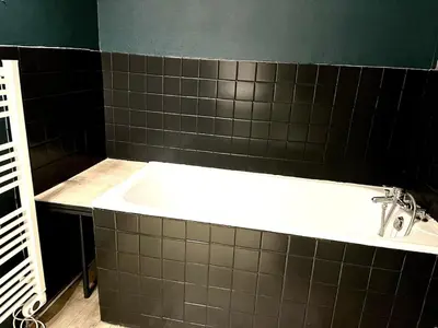 Salle de bains dans l'établissement Le Zola