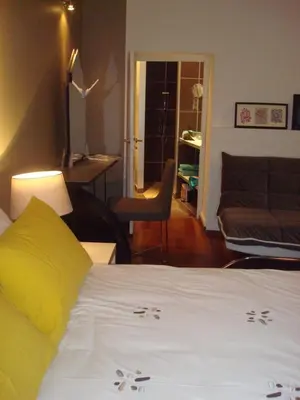 Un ou plusieurs lits dans un hébergement de l'établissement Appartements Caractere Clos St Jean