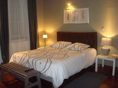 Un ou plusieurs lits dans un hébergement de l'établissement Appartements Caractere Clos St Jean
