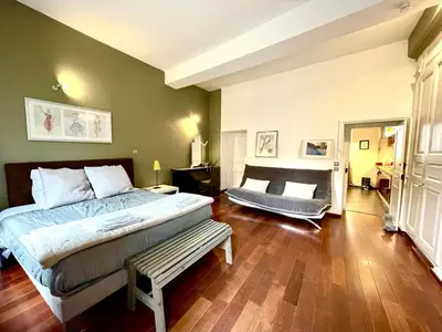 Un ou plusieurs lits dans un hébergement de l'établissement Appartements Caractere Clos St Jean