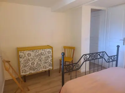 Un ou plusieurs lits dans un hébergement de l'établissement Appartement cozy T2 dans maison en RDC proche de Chalon sur Saone
