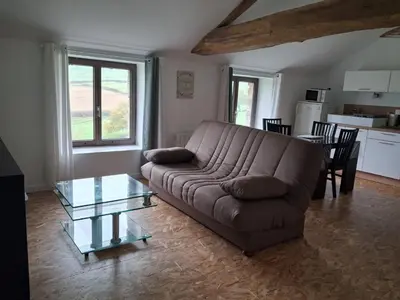 Coin salon dans l'établissement Les Gîtes de Sophinette