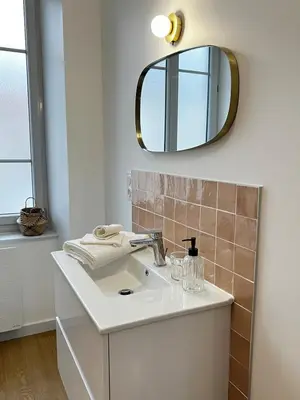 Salle de bains dans l'établissement Les appartements du lac