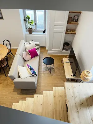 Coin salon dans l'établissement Les appartements du lac
