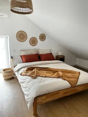 Un ou plusieurs lits dans un hébergement de l'établissement Les appartements du lac