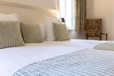 Un ou plusieurs lits dans un hébergement de l'établissement Château de Couches dit de Marguerite de Bourgogne