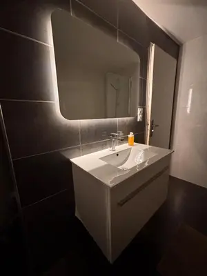 Salle de bains dans l'établissement Le Familial Dijonnais - Musée Archéologique