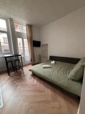 Un ou plusieurs lits dans un hébergement de l'établissement Le Balcon Dijonnais - Cours Cambronne