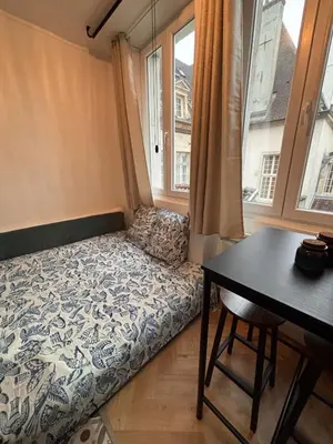 Un ou plusieurs lits dans un hébergement de l'établissement Le Cocon Dijonnais - Cours Cambronne