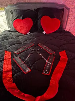 Un ou plusieurs lits dans un hébergement de l'établissement Évasion secrète, Love room & SPA