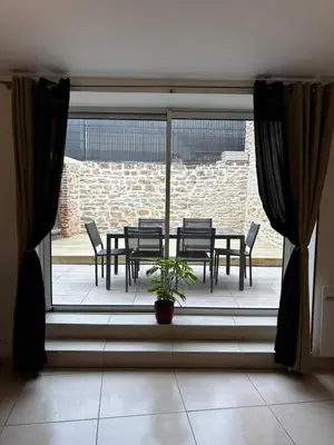 Coin salon dans l'établissement Maison Spacieuse et Lumineuse