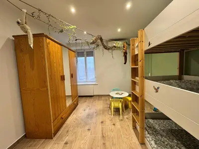 Cuisine ou kitchenette dans l'établissement Les Platanes Appartement Le Tropical