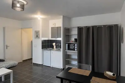 Cuisine ou kitchenette dans l'établissement Le Dijonnel