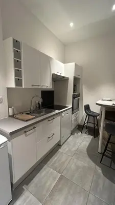 Cuisine ou kitchenette dans l'établissement le charme