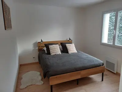 Un ou plusieurs lits dans un hébergement de l'établissement Maison neuve plein pied
