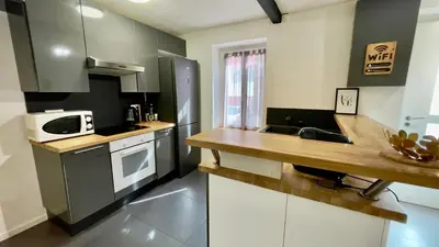 Cuisine ou kitchenette dans l'établissement T2 Cosy et Proche gare