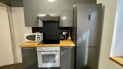 Cuisine ou kitchenette dans l'établissement T2 Cosy et Proche gare